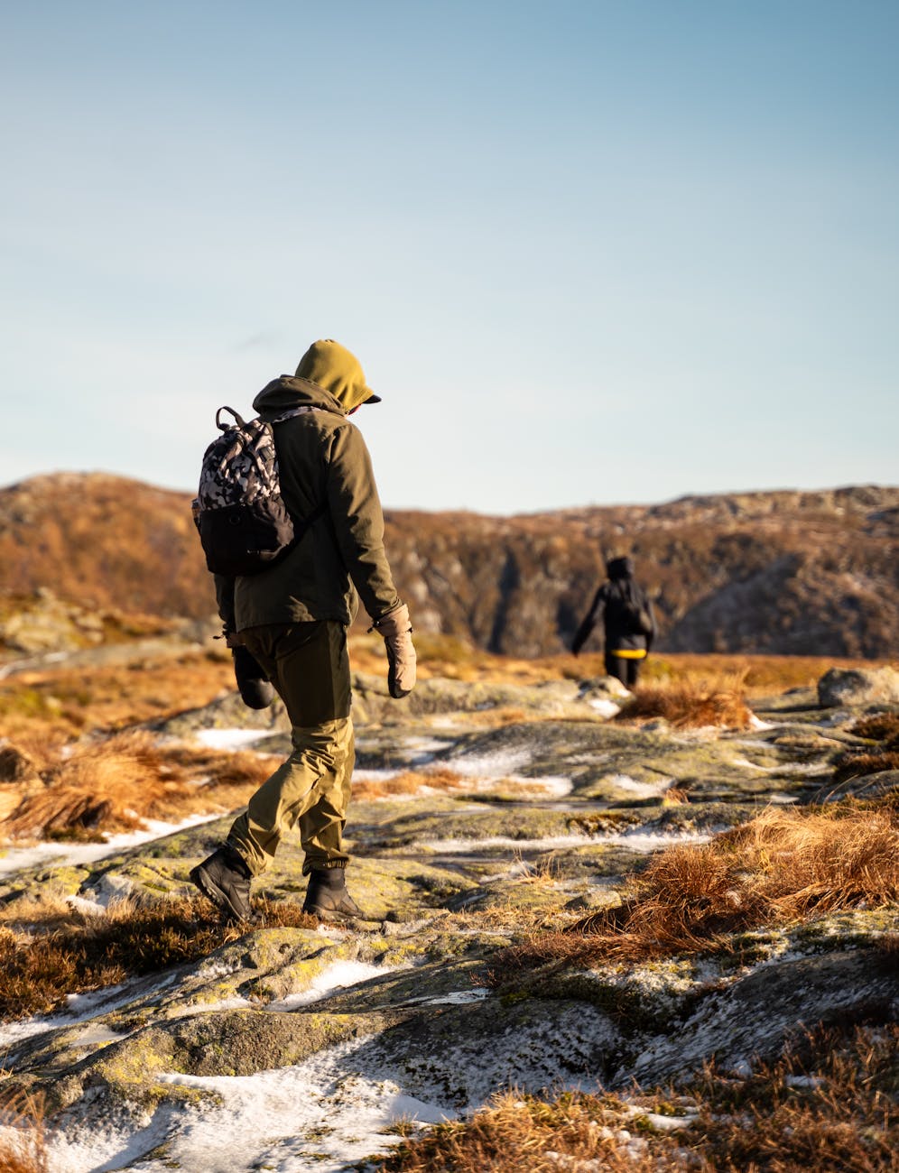 hikers exploring scenic mountain trail in fall